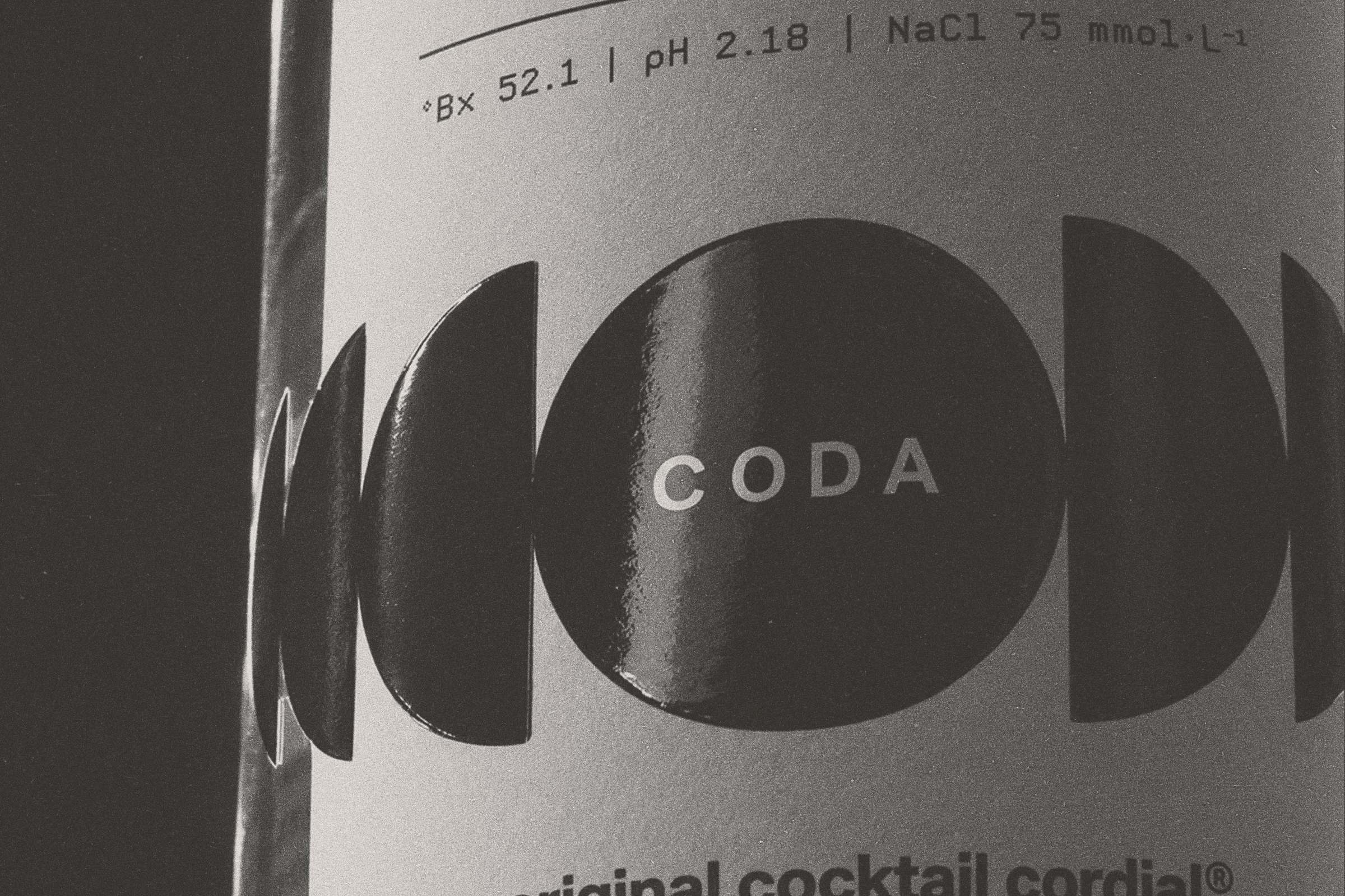 The Coda label, close: the logomark and the spec line